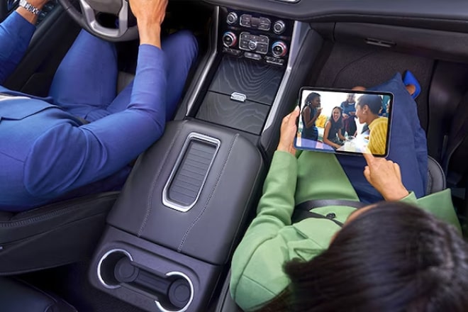 Girl watching a show with the help of OnStar.