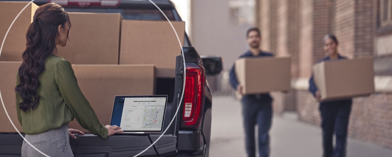 Woman using OnStar Vehicle Insights.