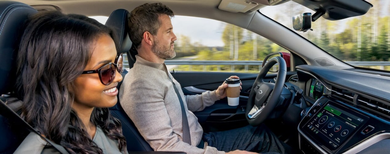 A couple driving to visit the waterfalls with OnStar.